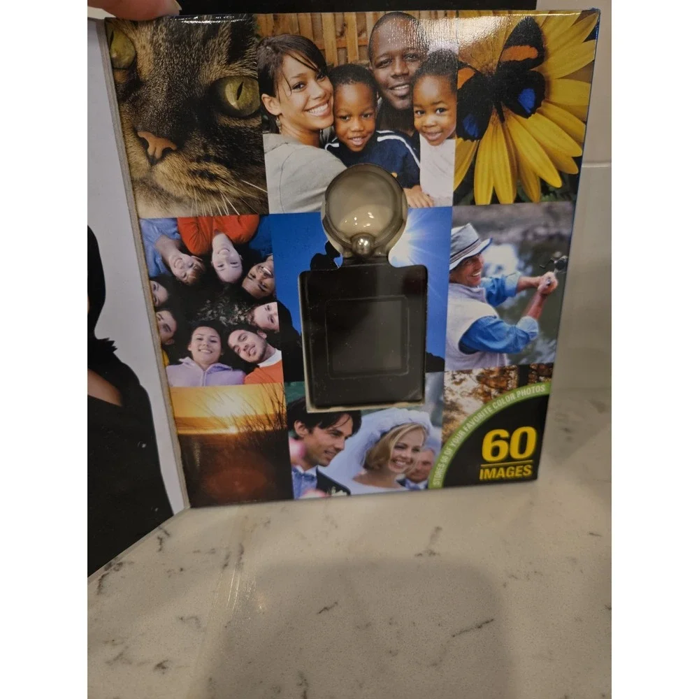 The Sharper Image Rechargeable USB 2.0 Digital Keychain Photo Album 1.4